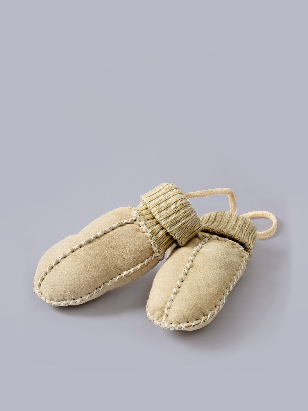 Babyhandschuhe aus Lammfell mit Strickbündchen