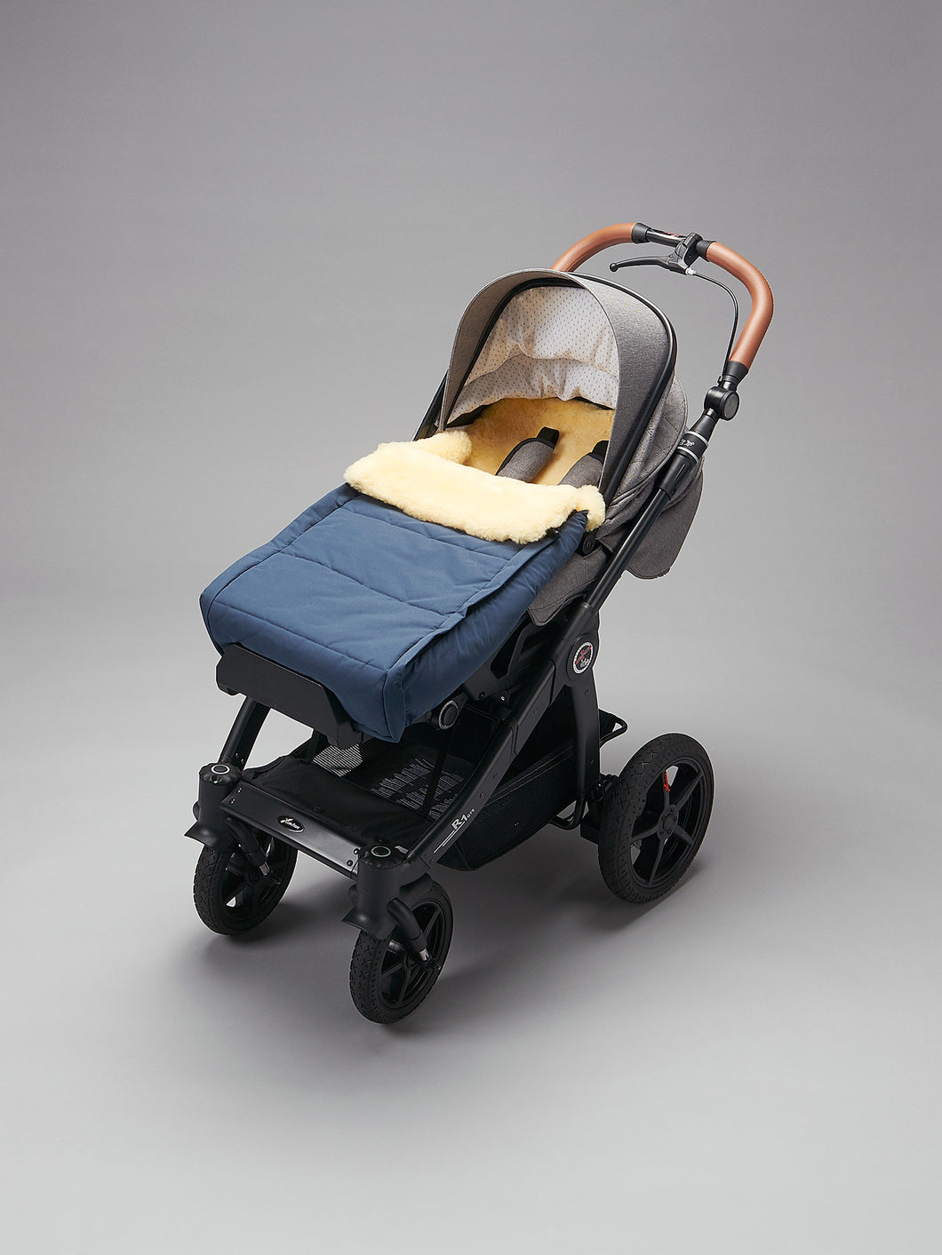Kinderwagen-Fusssack, mit Lammfell gefüttert